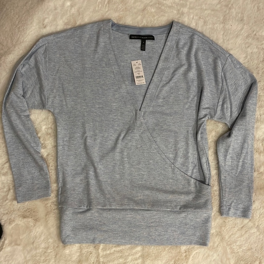 WHBM light blue faux wrap knit top.  Size Small.